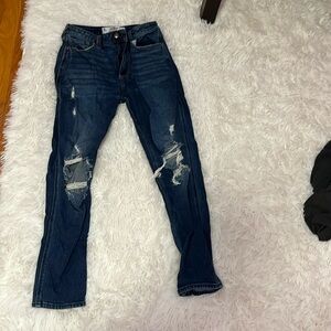 fashionable ripped dark blue curvy high rise mom jeans